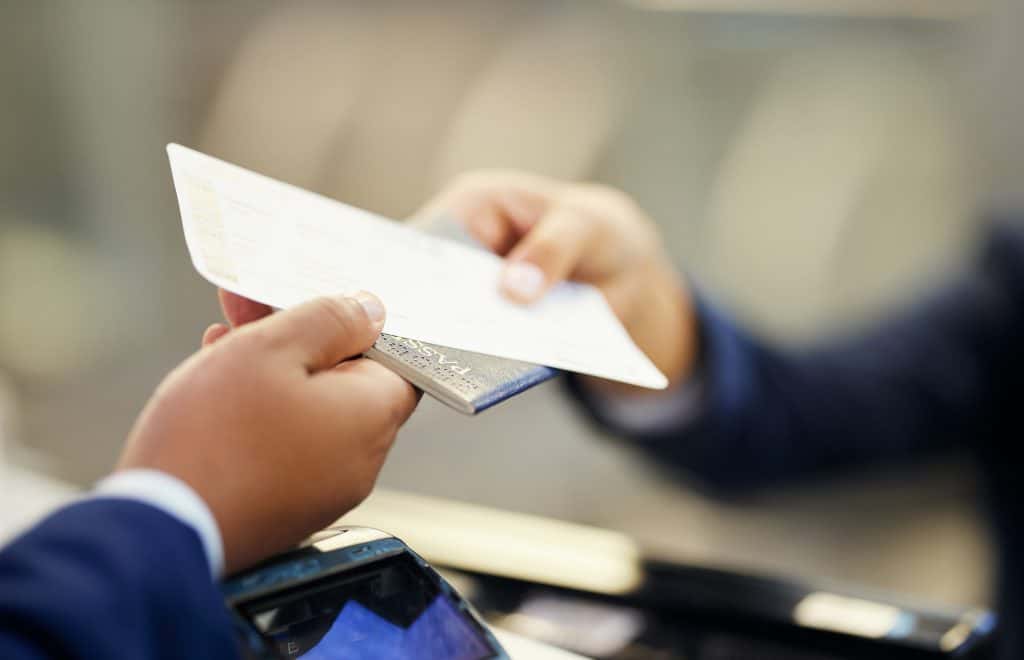 Ticket airport and person with passport